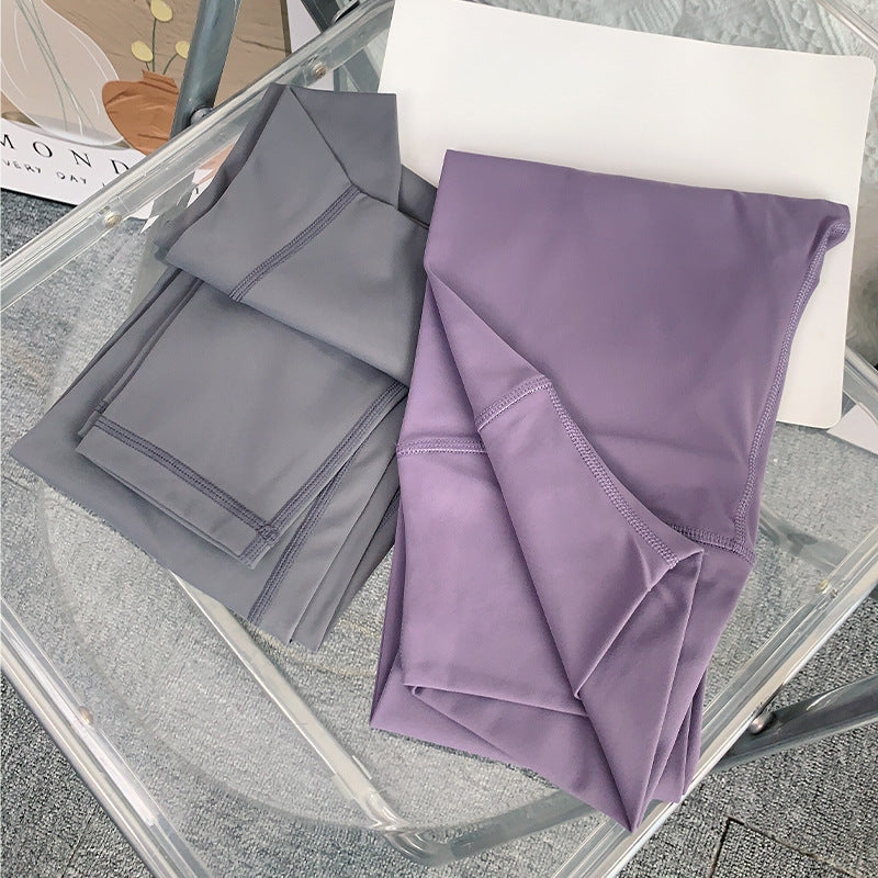Unleash Your Inner Athlete with Our Hip Lifting Peach Stretch Skinny Running Fitness Pants